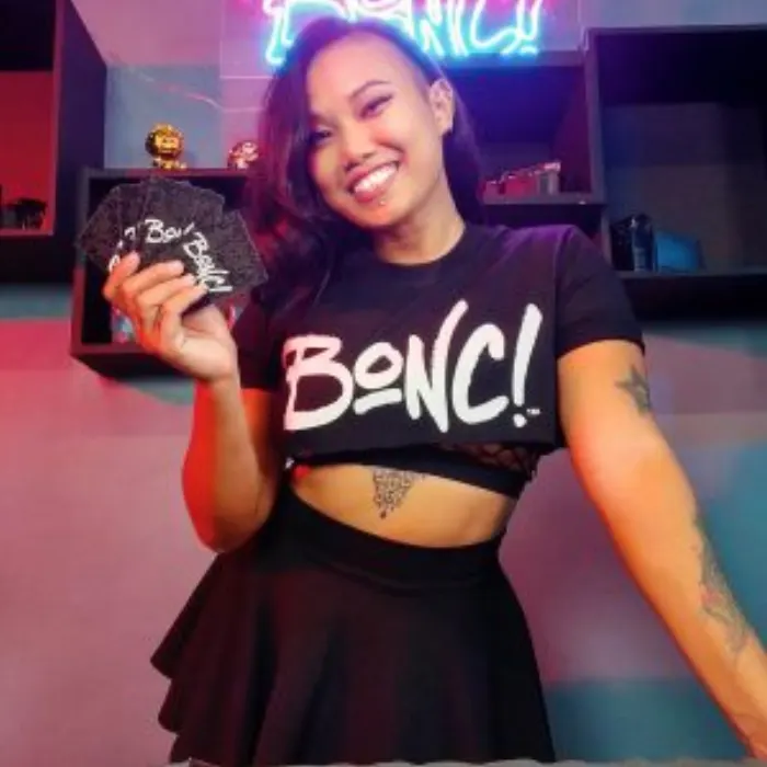 Paula holding a BONC! card
